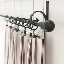 Add rustic richness to any décor from metro to mountainside with this 3/4" forged iron Or textured wood rod. This collection offers an exceptional combination of forged iron, leather and dark textured wood which can be harmoniously mixed for a warm, layered look. Simplistic styling and rich materials are spot on, making this a natural collection to consider when designing a cabin or mountainside look for you home or project.