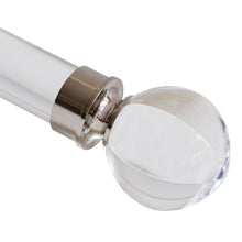 A handsome combination of beautiful glass finials and premium brass metal for the finest of homes. The collection offers acrylic poles that are not only stylish, but extremely thick and durable. The look is clean, crisp and contemporary. This hand-drawn hardware system maneuvers pleated drapery creations by baton.