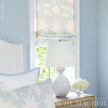 Custom-made Schumacher Garden of Persia modern cordless roman shade in the color Blue & White floral created by katemarcellahome. This linen fabric is the most fashionable pattern for your space this season. Inspired by an antique Persian carpet, this large-scale, graphic print by Mary McDonald features symmetrical silhouettes of flowers and leaves. Also available as a wallpaper.