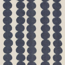 Custom-made drapery in high-end, Schumacher Full Circle fabric by one of our professional craftsmen in our custom workroom katemarcellahome. When an artisanal warp print meets a graphic stripe made of circles, the results are enchanting. Available in Faded black, jungle, navy, saffron and bittersweet.