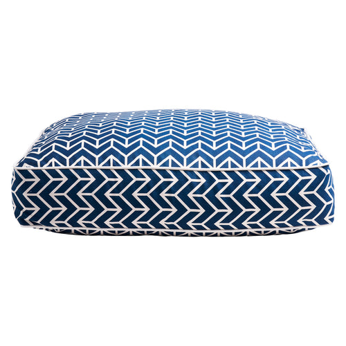 Give your dog a chic place to curl up and dream his sweet doggie dreams. This generously sized rectangular dog bed is covered in our indoor/outdoor Chevron, a crisp and clean graphic design that’s classic Schumacher. The indoor/outdoor fabric is ultra-durable, while the contrasting white welt gives the bed a tailored look that fits in with even the most formal of living rooms.
